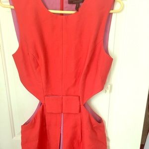 An elegant cut out cocktail dress.